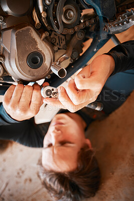 Buy stock photo Hands, mechanic and engine gears in motor repairs with tools for bolts, safety or mechanical parts. Hand of engineer fixing motorbike, transport or transmission on automobile or vehicle in workshop