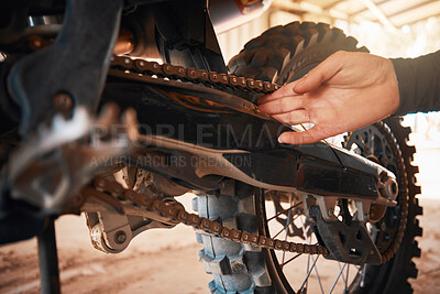 Buy stock photo Hands, mechanic and motorbike chain in repairs working on springs or timing for safety or mechanical parts. Hand of engineer fixing bike, transport or transmission on automobile or gears in workshop