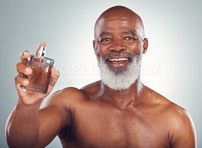 Buy stock photo Elderly black man, perfume and smile in portrait, beauty and skin, grooming and hygiene isolated on studio background. Happiness, wellness and skincare, cosmetic product and topless with fragrance