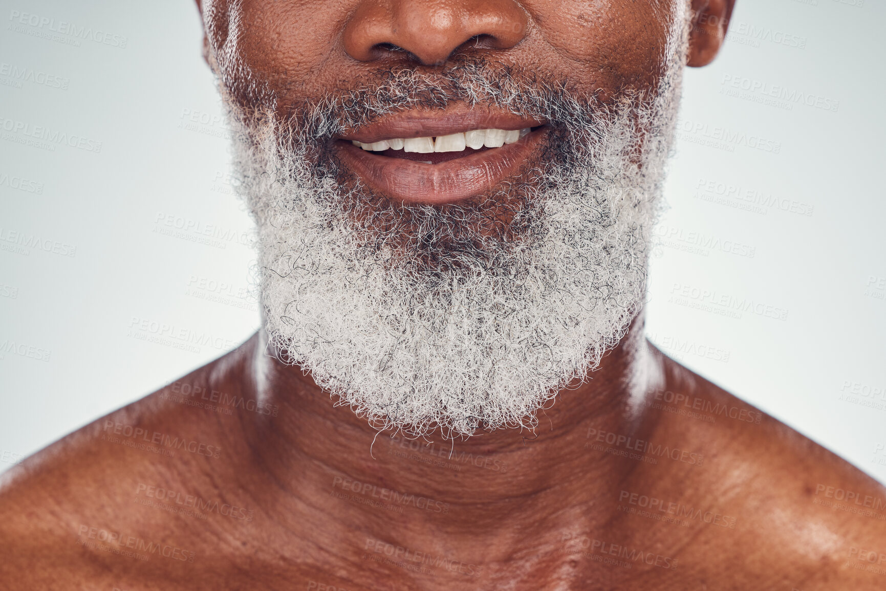 Buy stock photo Smile, beard and face with a senior black man grooming in studio on a gray background for beauty or skincare. Skin, hygiene and cosmetics with a mature male indoor to promote facial hair maintenance