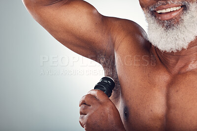 Buy stock photo Studio, black man and armpit with deodorant, smile and body care and grooming space isolated on grey background. Skincare, health and happy senior male with skin product for cleaning and wellness.