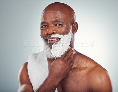 Buy stock photo Black man, face and shaving cream, smile in portrait for beauty and grooming isolated on studio background. Facial hair removal, happy elderly person and hygiene with skincare, glow and wellness