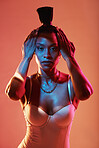 Portrait, hands and hair with a model black woman in studio on a neon background for beauty. Fashion, art and kaleidoscope with an attractive young female posing indoor for culture or cosmetics