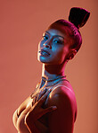 Portrait, fashion and kaleidoscope with a model black woman in studio on a neon background for beauty. Art, makeup and style with an attractive young female posing indoor for culture or cosmetics