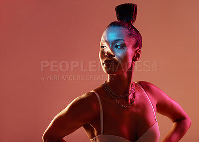 Buy stock photo Light, beauty and black woman profile with mockup feeling sexy and mystical with studio lights. Brown background, isolated and glow of a female model with blue face lighting and glamour pose