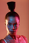 Portrait, makeup and neon with a model black woman in studio on a kaleidoscope background for beauty. Art, fashion and style with an attractive young female posing indoor for culture or cosmetics