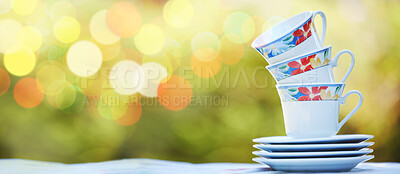 Buy stock photo Breakfast, hospitality and mockup with stack of teacup in park for catering, coffee and health. Brunch, service and design with pile of porcelain mugs on table for fine dining, buffet and kitchenware