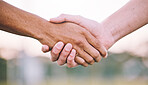 Closeup, handshake and support for sports, agreement and competition with collaboration, goal and target. Zoom, shaking hands or friends with solidarity, community or outdoor for match or partnership