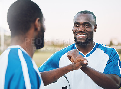 Buy stock photo Fist bump, soccer athlete and man with teamwork success of sports training on a grass field. Football friends, support and exercise support with motivation outdoor for health workout and smile