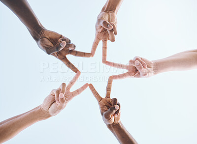 Buy stock photo Below, hands and star, sports and collaboration, partnership and huddle against sky background. Low angle, peace and friends hand sign support of teamwork, goal and mission, diversity and training 