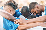 Soccer, team motivation and men huddle at sports competition or game for teamwork on a field. Football group people together for support, trust and fitness with diversity for planning strategy
