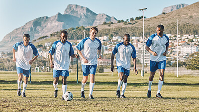 Soccer men, teamwork and ball sports on a field for competition or game with diversity. Football group people running on grass for fitness, performance and collaboration with motivation for a goal