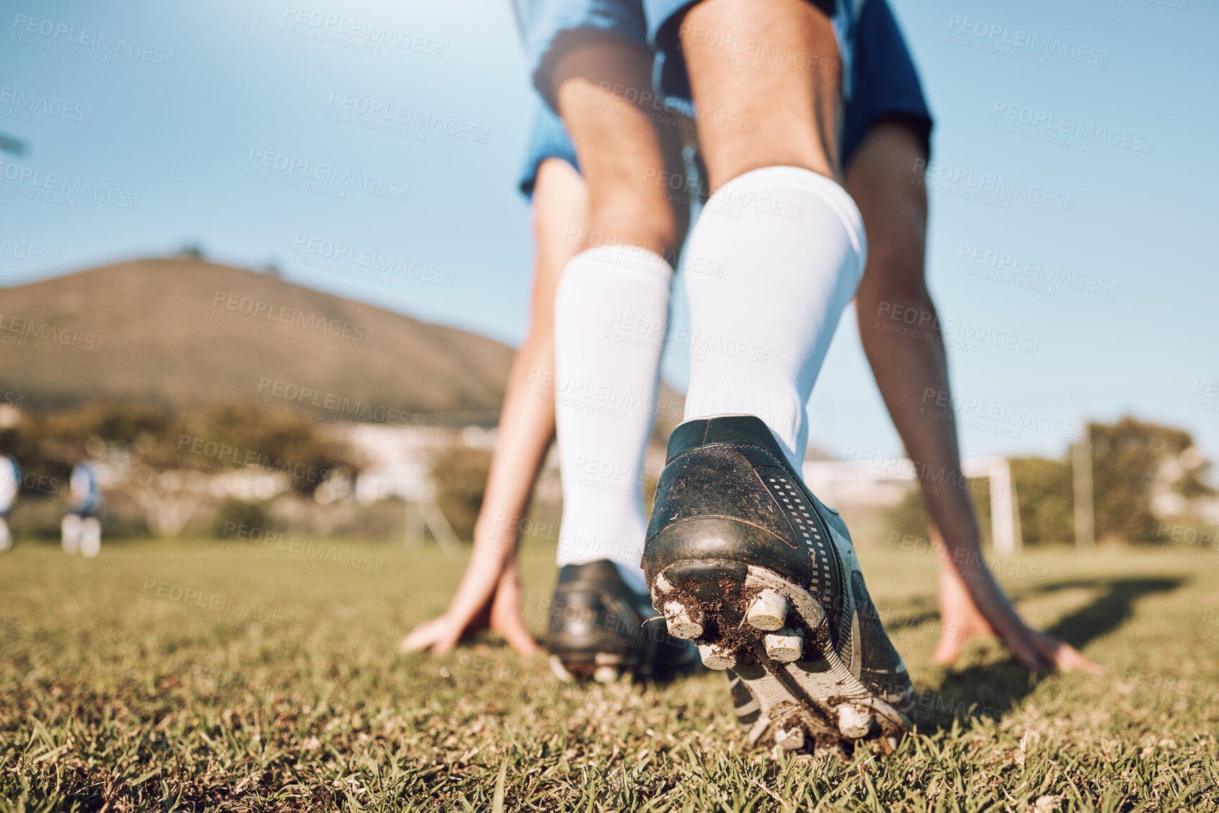 Buy stock photo Football player, shoes and start on field with sports and fitness outdoor, athlete legs and running in training session. Soccer, wellness and active lifestyle, professional sport man and team game