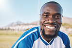 Portrait of black man with smile on face, football and sports mindset with motivation for winning game in Africa. Confident, proud and happy professional soccer player at exercise or training match.