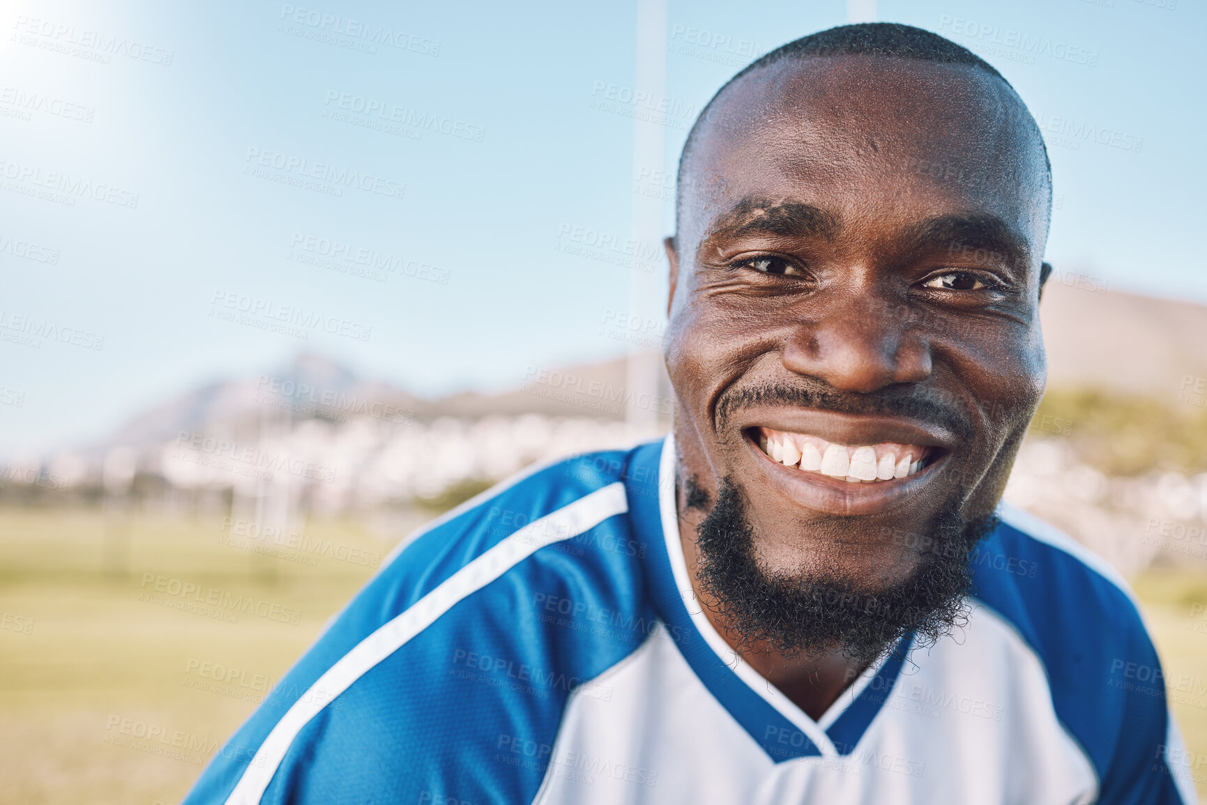 Buy stock photo Portrait of black man with smile on face, football and sports mindset with motivation for winning game in Africa. Confident, proud and happy professional soccer player at exercise or training match.