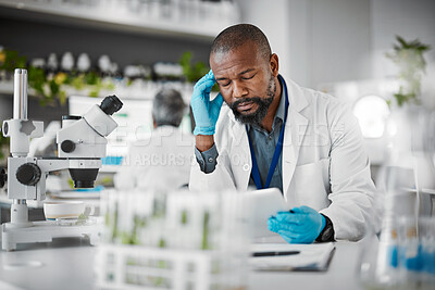Buy stock photo Headache, tired and scientist man in plants test laboratory on tablet pharmaceutical research or data results. Mental health, fatigue or burnout african science person thinking, stress or risk report