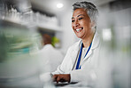 Elderly woman, lab and laptop for research, science and plants for analytics, pharmaceutical study and focus. Senior scientist, expert or computer for typing with data analysis for goal in laboratory