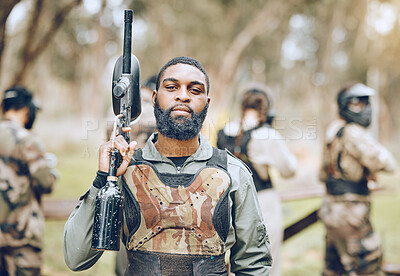 Buy stock photo Paintball, gun and portrait of black man in park ready for games, match and shooting battle outdoors. Extreme sports, adventure and male in camouflage, military clothes and action gear for arena