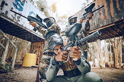 Buy stock photo Paintball teamwork, shooting together and war game with vision, mask or tactical strategy for safety in competition. Military training, team building and group with weapon, combat and friends outdoor