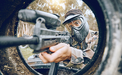 Buy stock photo Paintball, gun and man with focus, safety uniform and extreme sports for activity, gear and competition. Teamwork, male player or guy with camouflage, shooting paint rifle or military weapon for game
