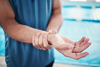 Buy stock photo Pain in wrist, sports and man by swimming pool with injury, muscle ache and arthritis inflammation. Wellness, medical care and hands of male with accident or bruise from fitness, exercise or training
