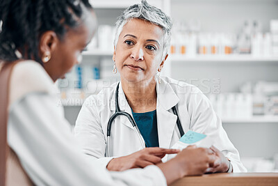 Buy stock photo Pharmacy, senior woman help client and prescription for healthcare, diagnosis and cure for illness and disease. Medical professional, female customer or lady reading information, assist or pharmacist