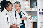 Pharmacy, inventory and women on digital tablet for prescription, label and information check. Pharmacist, colleagues and ladies online, internet and search while doing stock at a clinic dispensary 