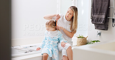 Buy stock photo Hair care, mother and girl in bathroom, with brush and bonding to connect, talking and for fun. Female, lady and daughter or kid doing development, child growth and discussion together at home loving