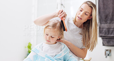 Buy stock photo Morning, mother and daughter in bathroom with hairbrush for grooming care routine in family home. Motherhood, child and mama brushing hair of young kid in house and getting ready for the day.