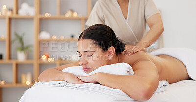 Buy stock photo Woman, spa bed and hands for shoulder massage, care and professional treatment for muscle, stress and wellness. Girl, masseuse and holiday for physical therapy, spine and recovery at luxury resort