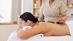 Spa wellness, massage and woman relax healthy skincare wellness treatment. Young calm sleeping girl, zen therapy masseuse hands and serenity stress relief on back or body luxury hot stone detox