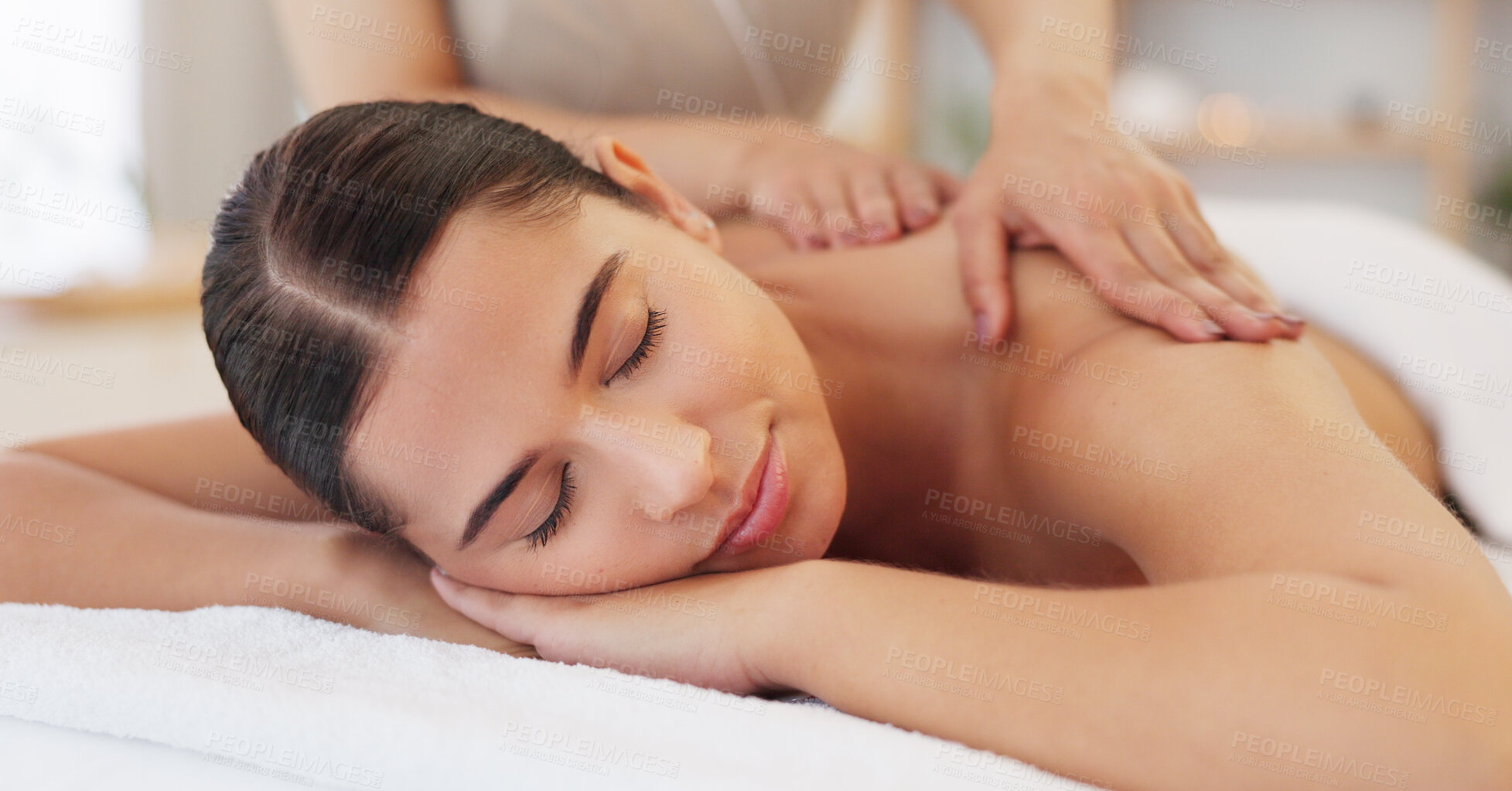 Buy stock photo Back, massage and hands on woman with care in spa, wellness resort or calm luxury service to relax in peace. Body, therapist and press muscle to release stress in healthy meditation or healing