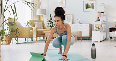 Buy stock photo Woman, tablet and home yoga for workout, online class and streaming in living room for meditation, wellness or health. Young person on floor for pilates, exercise and fitness on digital or video call