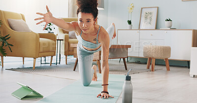 Buy stock photo Yoga, tablet and woman with online video for stretching exercise in the living room of her house. Girl with balance during fitness workout on the internet with tech in the lounge of her home