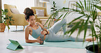 Fitness, relax and woman drinking water in living room with tablet streaming online class for workout, health and exercise. Yoga, internet or e learning with athlete in home gym training for wellness