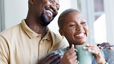 Buy stock photo Relax, love and couple hug and smile with coffee drink break at window to enjoy while they bond together. Kind, caring and happy boyfriend giving black woman beverage with romantic embrace in home. 