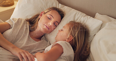 Bed, mom and child relax sleep together in bed, calm and peace in bedroom at night in home. Tired young mother, kid girl sleeping and childhood support, trust and care in safe peaceful family house