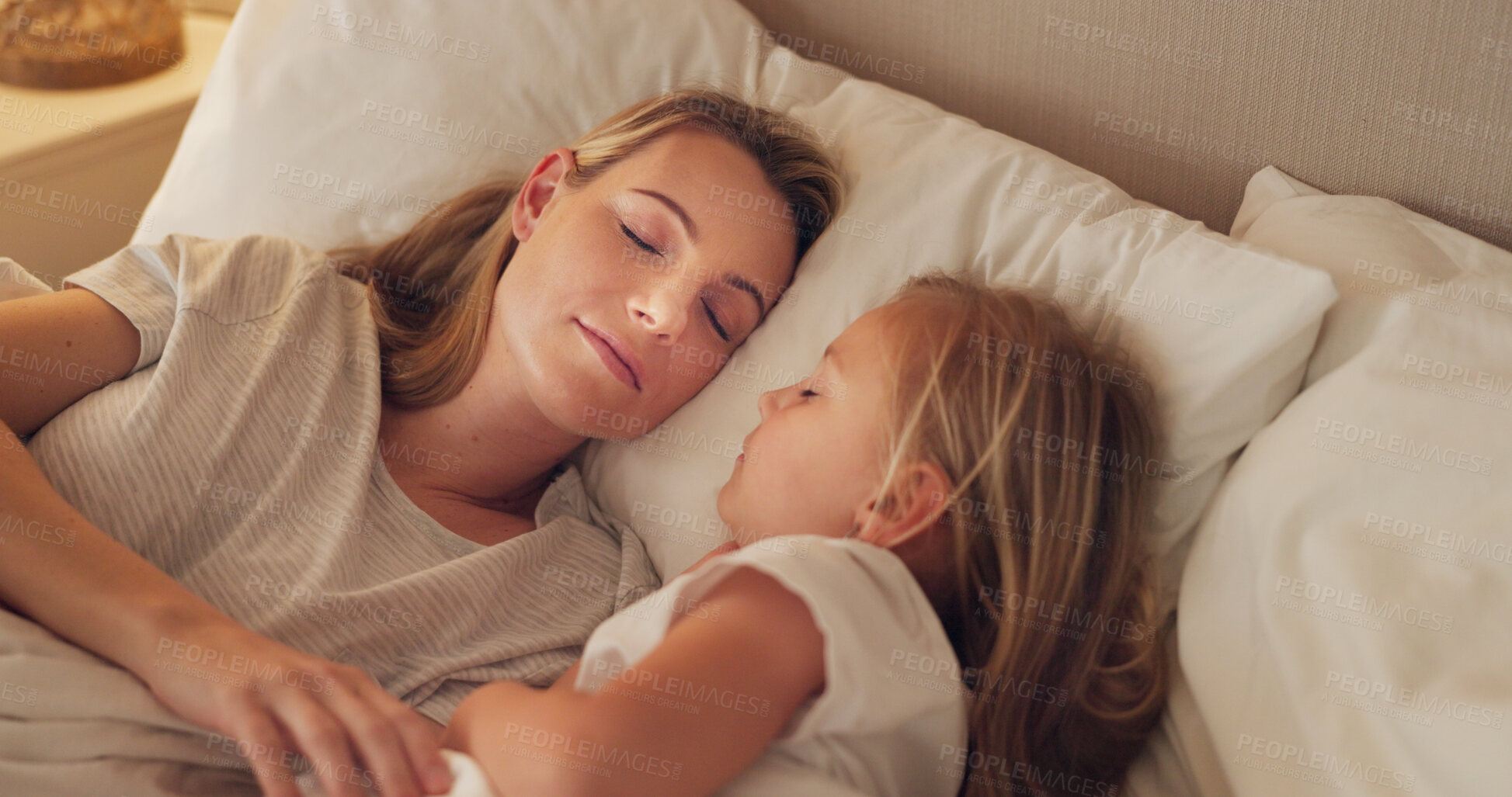 Buy stock photo Bed, mom and child relax in sleeping together with calm, peace and rest in bedroom at night or morning in house. Tired, mother and girl sleep with healthy, support and comfort in family home