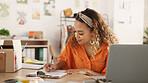 Clipboard, laptop and black woman writing in clothing store working on sales or delivery. Fashion, manager and worker in South Africa in small business, fashion shop and planning schedule on computer