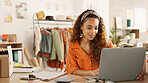 Clipboard, laptop and black woman writing in clothing store working on sales or delivery. Fashion, manager and worker in South Africa in small business, fashion shop and planning schedule on computer