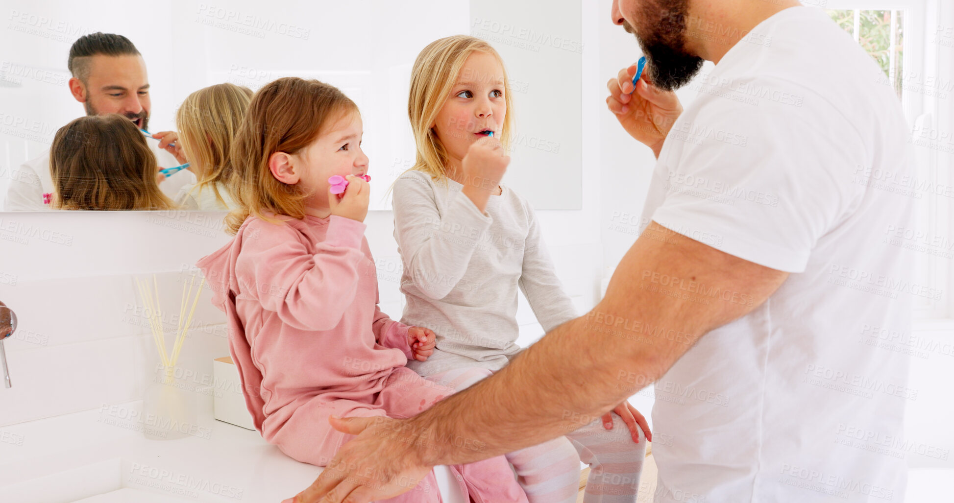 Buy stock photo Love, brushing teeth and father with children in a bathroom for dental, wellness and bond at home. Mouth, cleaning and kids with parent in the morning for oral care, learning and fun with teaching