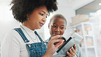 Business women with digital tablet for a brainstorming, strategy and teamwork meeting in the office. Happy, diversity and corporate marketing professional using technology while talking and planning