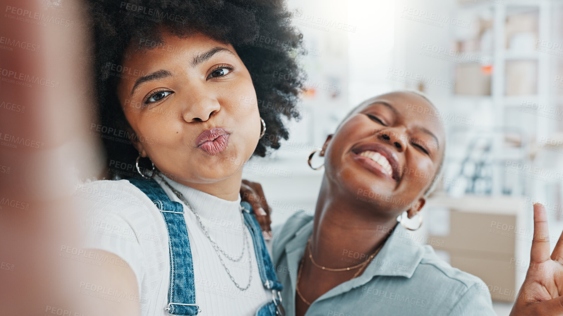 Buy stock photo Selfie, silly and portrait of women in the office for startup business partnership together. Happy, goofy and African female entrepreneurs taking picture for team building, fun or memory in workplace
