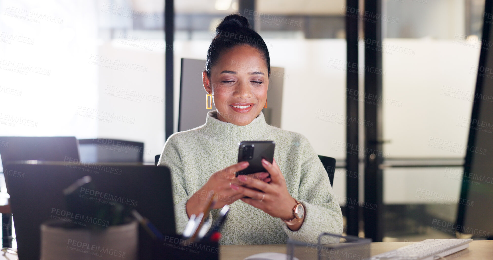 Buy stock photo Phone, communication and a business woman working on her computer for a schedule update in the office. Contact, search and young professional employee at work for mobile lead generation or networking