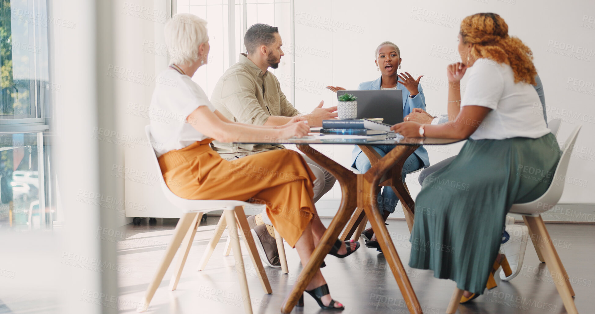 Buy stock photo Black woman, leadership and meeting in creative business, planning or collaboration in team startup ay office. African female person talking to employees or training staff in discussion at workplace