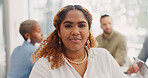 Face of a business woman in meeting with her corporate team in the office. Happiness, success and portrait of professional female employee from Mexico sitting in workplace discussion