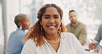 Happy, smile and face of a business woman in meeting with her corporate team in the office. Happiness, success and portrait of professional female employee from Mexico sitting in workplace discussion