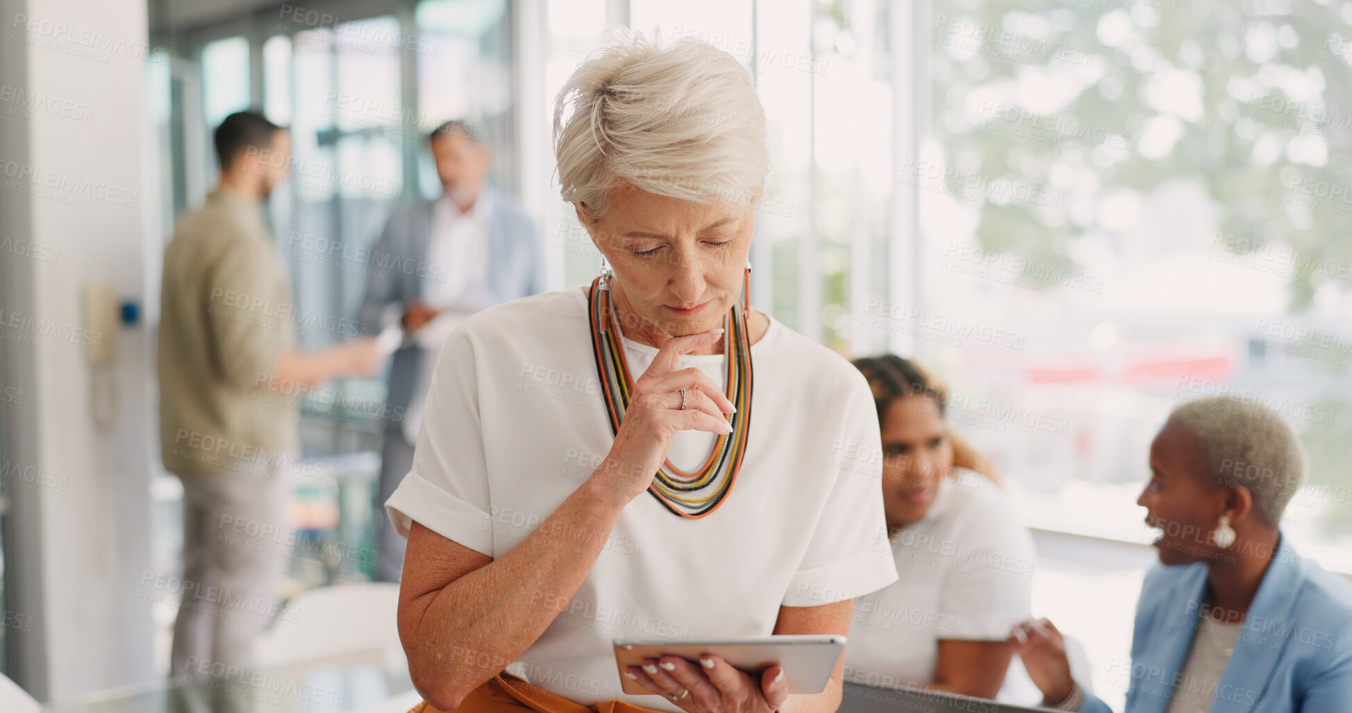 Buy stock photo Tablet, thinking and mature woman in office meeting for workshop for corporate business people. Strategy, planning or online schedule app, agenda or review, businesswoman or project manager at agency