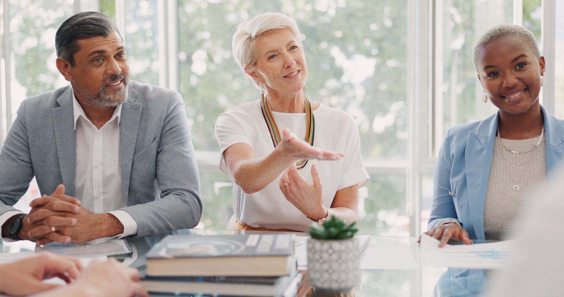 Buy stock photo Meeting, management and review with a leadership team in an office boardroom talking to an employee. Collaboration, planning and coaching with a group of business people in the workplace for training