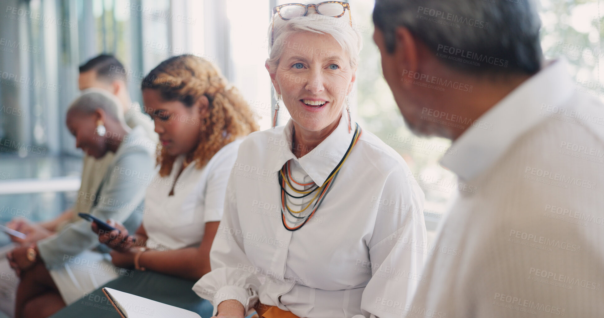 Buy stock photo People, talking and waiting room for recruitment job interview in an advertising agency. Conversation, group and happy senior woman meeting in line for opportunity, training or networking at office